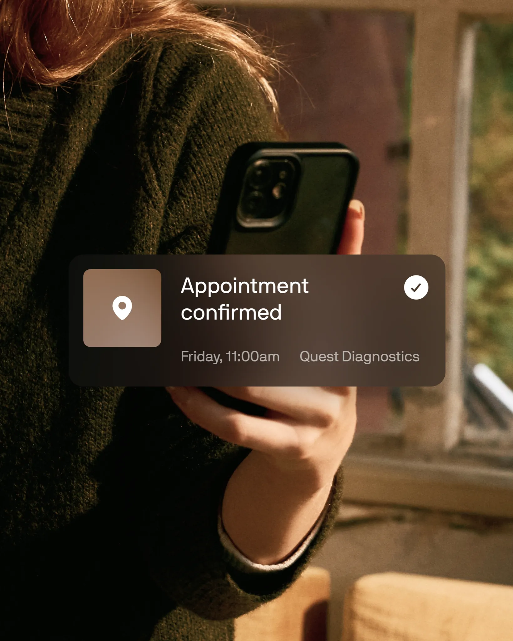 A member booking her draw from her phone at home